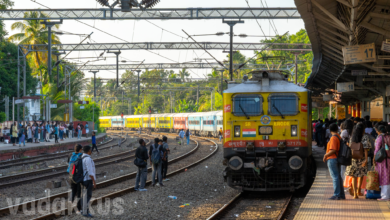 commuter train at railway station in Kerala